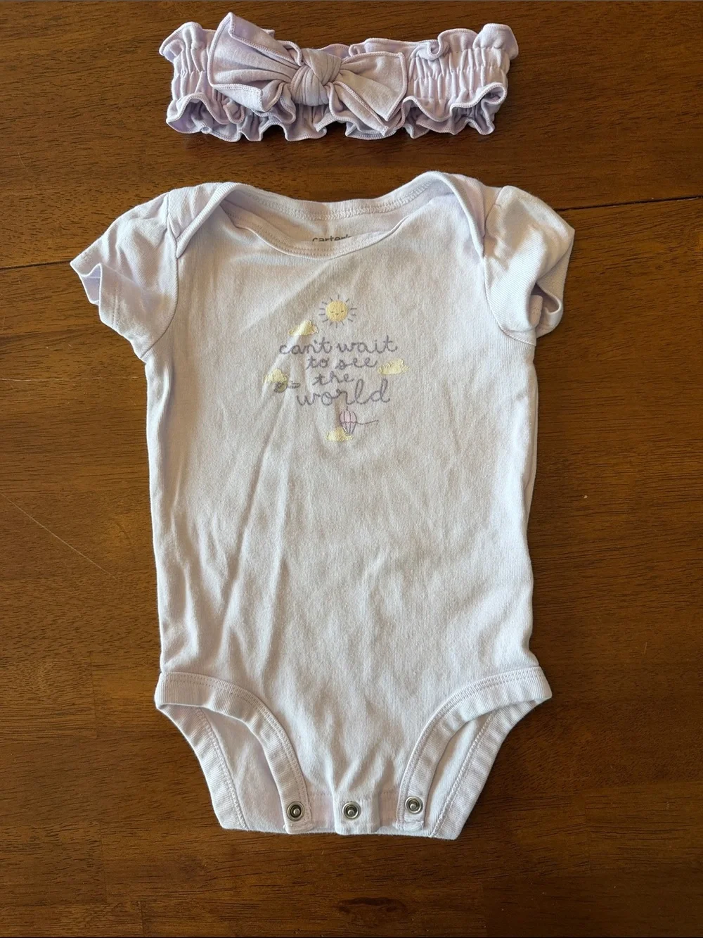 Carter's Baby Girl Mixed One-Piece Sets - Purple, Yellow, and Pink.